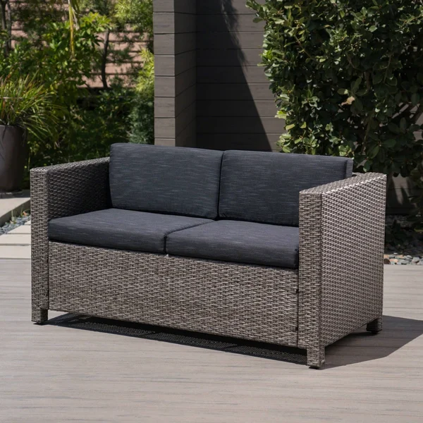 Puerta Outdoor Wicker Loveseat with Cushion by Christopher Knight Home grey/mixed Black Cushion