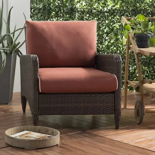 Mosca Ottoman with Cushion World Menagerie Cushion Color: Sangria