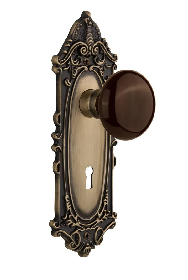 Nostalgic Warehouse 712569 Victorian Plate with Keyhole Passage Brown Porcelain Door Knob - Antique Brass