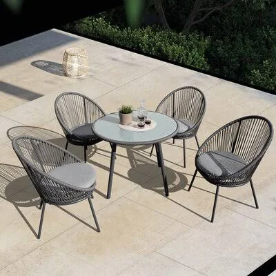 Glora Round 4 - Person 35.4'' Long Dining Set with Cushions Corrigan Studio Frame Color: Gray